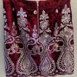 Burgundy velvet mini skirt with silver sequins